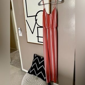 Boutique Orange jumpsuit with slit leg